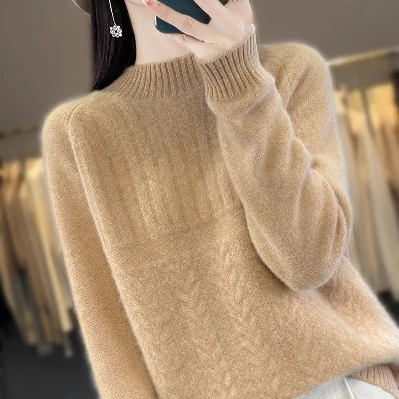 Beige women’s wool knit pullover sweater with a soft knit texture, ribbed crew neckline, and long sleeves.