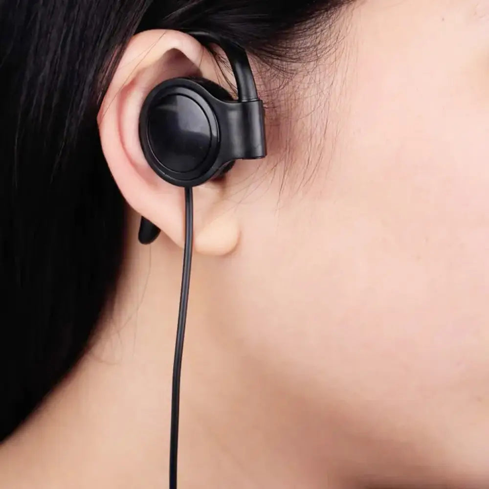 Black single ear hook 3.5mm wired headphone featuring a curved ear hook and thin cable designed for sports use.