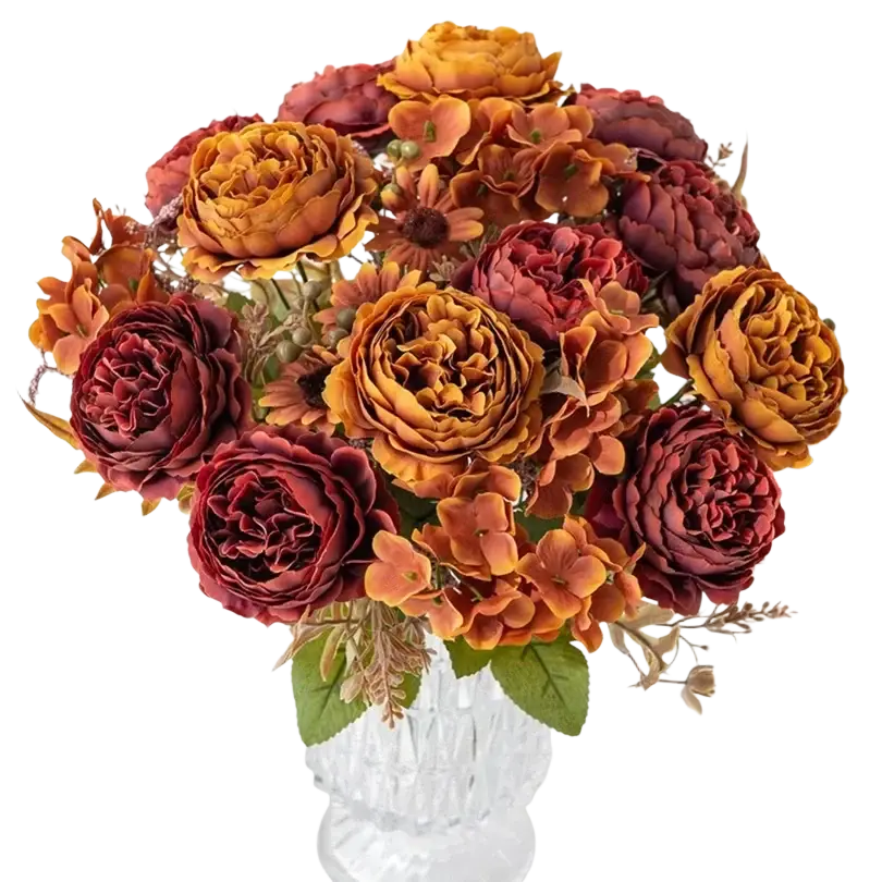 A lush bouquet of artificial flowers silk persian peonies and hydrangeas in burgundy amber and rust tones for home decoration