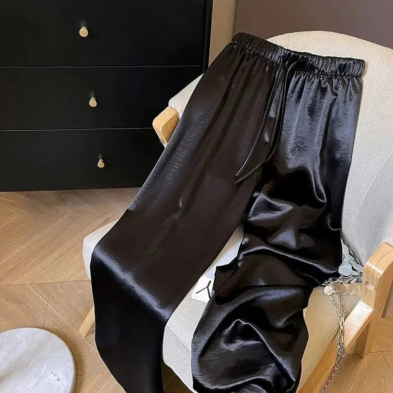 Schwarze Satin-Hosen mit weitem Bein für Damen mit elastischem Bund und Kordelverschluss