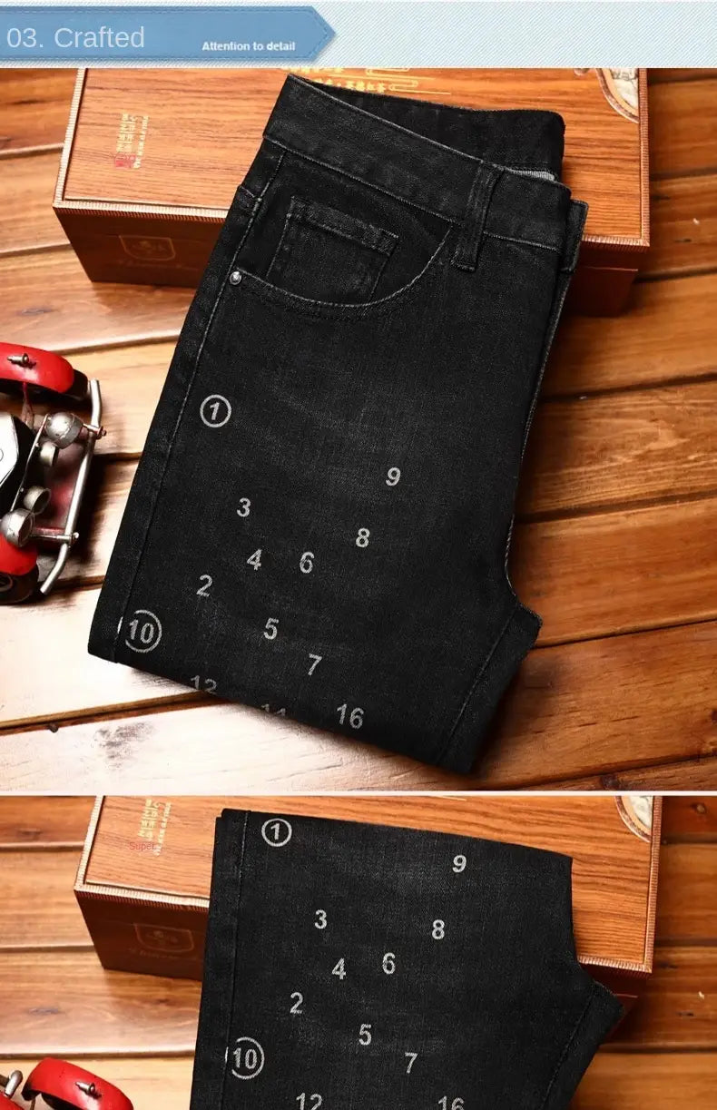 mens slim fit printed black denim jeans in black denim with a classic five-pocket design and subtle fading details