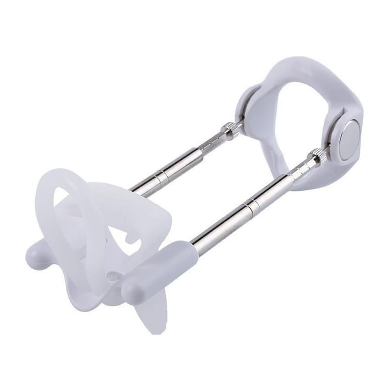 White silicone and metallic adjustable penis exerciser with two extendable rods displayed on a home gym storage rack organizer for fitness equipment.