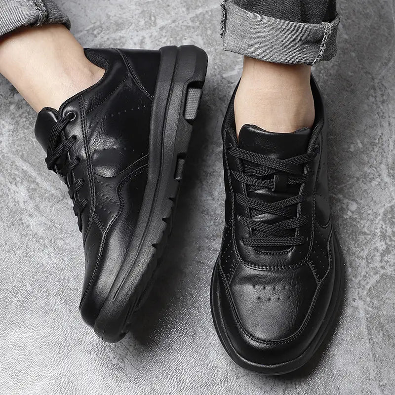 Men black leather chunky sole sneakers featuring a thick cushioned sole and subtle perforations on the upper
