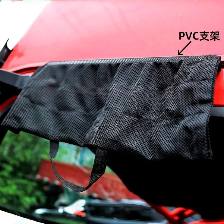 Sombrilla para el sol de la cabina de camión, para hamaca de viaje, con malla de poliéster negra y estructura de PVC, mostrada desde el lado posterior.