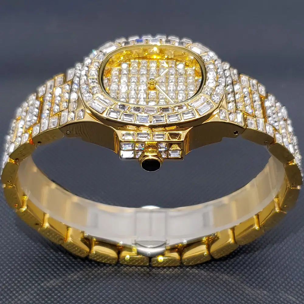 Gold-tone iced out diamond quartz watch for men with a silver stainless steel bezel and band encrusted in clear baguette-cut crystals.