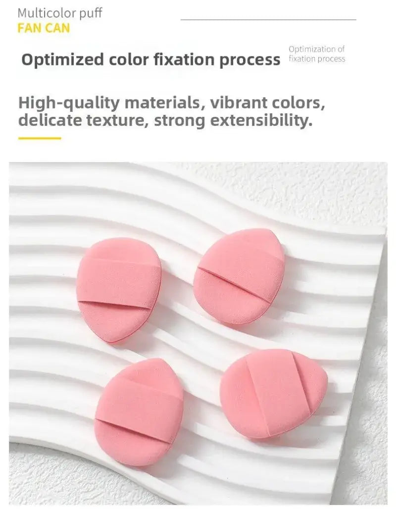 pink oval-shaped makeup blending sponges with a soft textured surface and central slit designed for easy handling in a makeup brush and sponge set for makeup application and eye makeup application