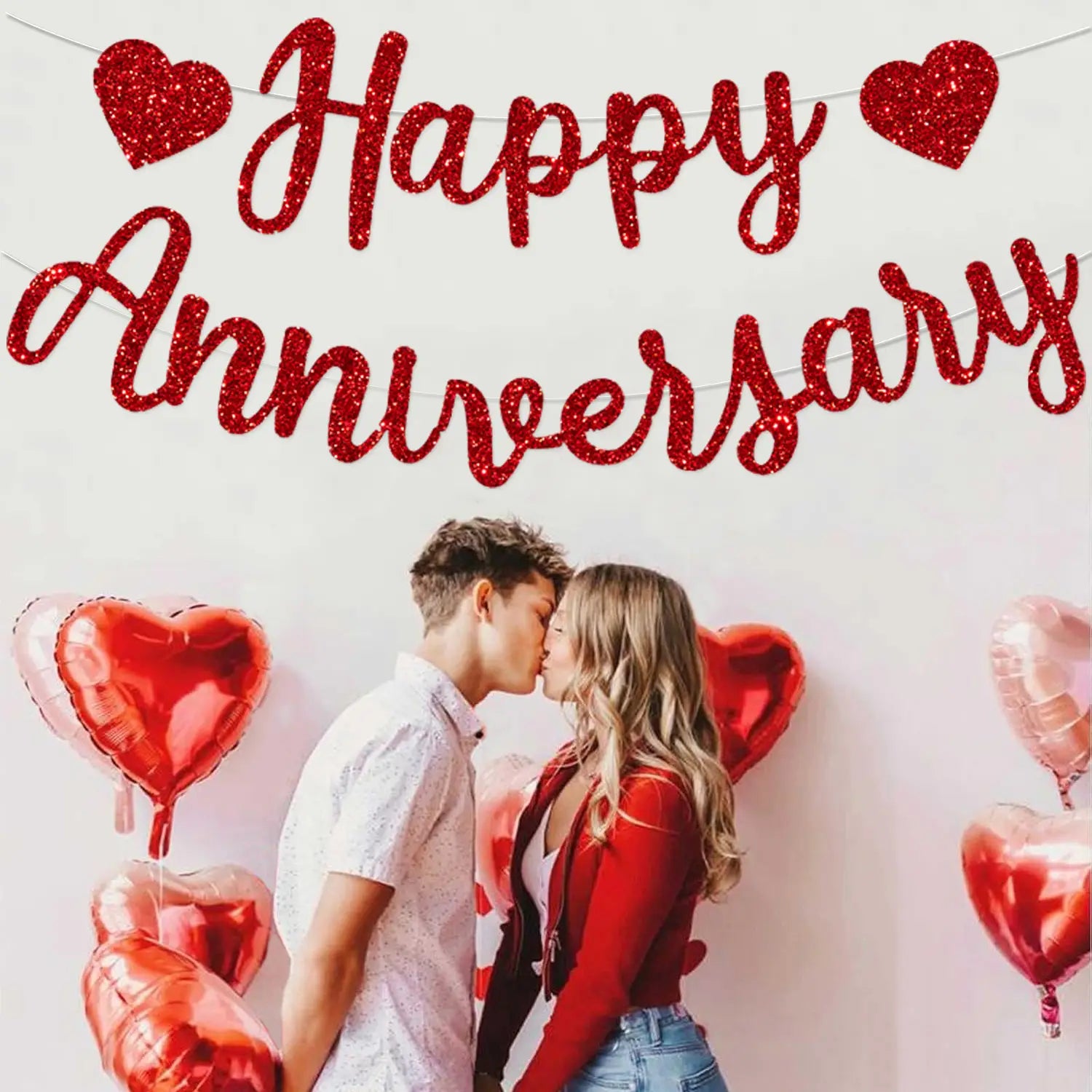red glittery happy anniversary banner with heart-shaped decorations for party decoration glitter sign