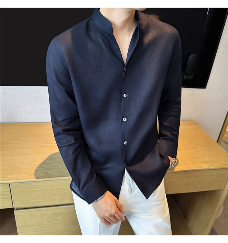 Men’s dark navy linen mandarin collar shirt with long sleeves and subtle sheen.