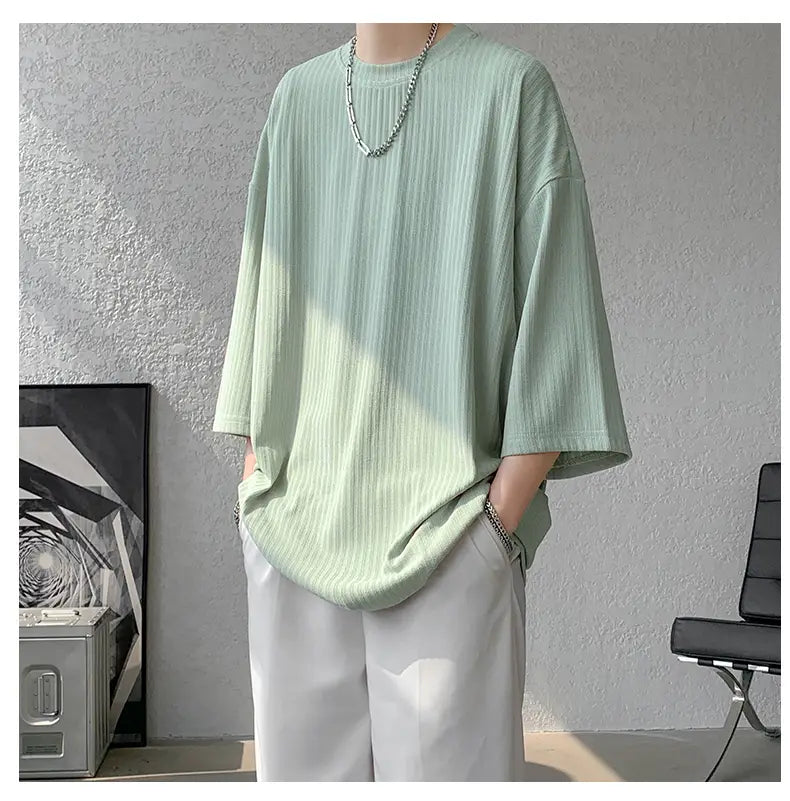 Light green ribbed cotton t-shirt with three-quarter sleeves from men striped oversized summer tshirt collection.