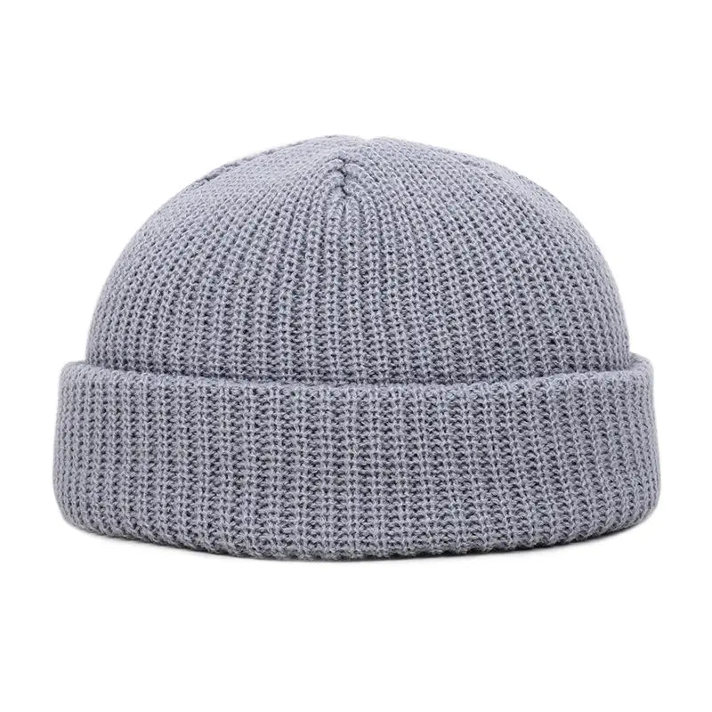 gray knitted ribbed knit winter beanie hat with a folded brim designed as a unisex warm cap