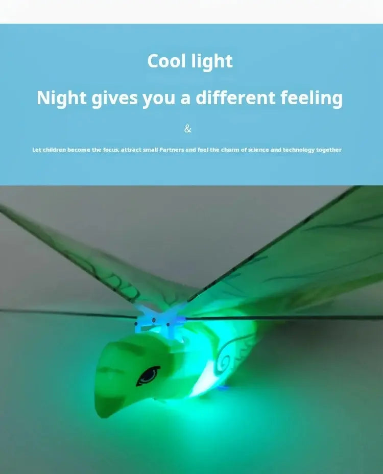 Remote control flying bird toy featuring a green glowing body with translucent wings designed for outdoor remote control use.