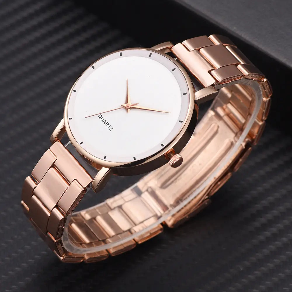 Rose gold women luxury watch featuring a rose gold-tone stainless steel case with a minimalist white dial and simple black hour markers for business use.