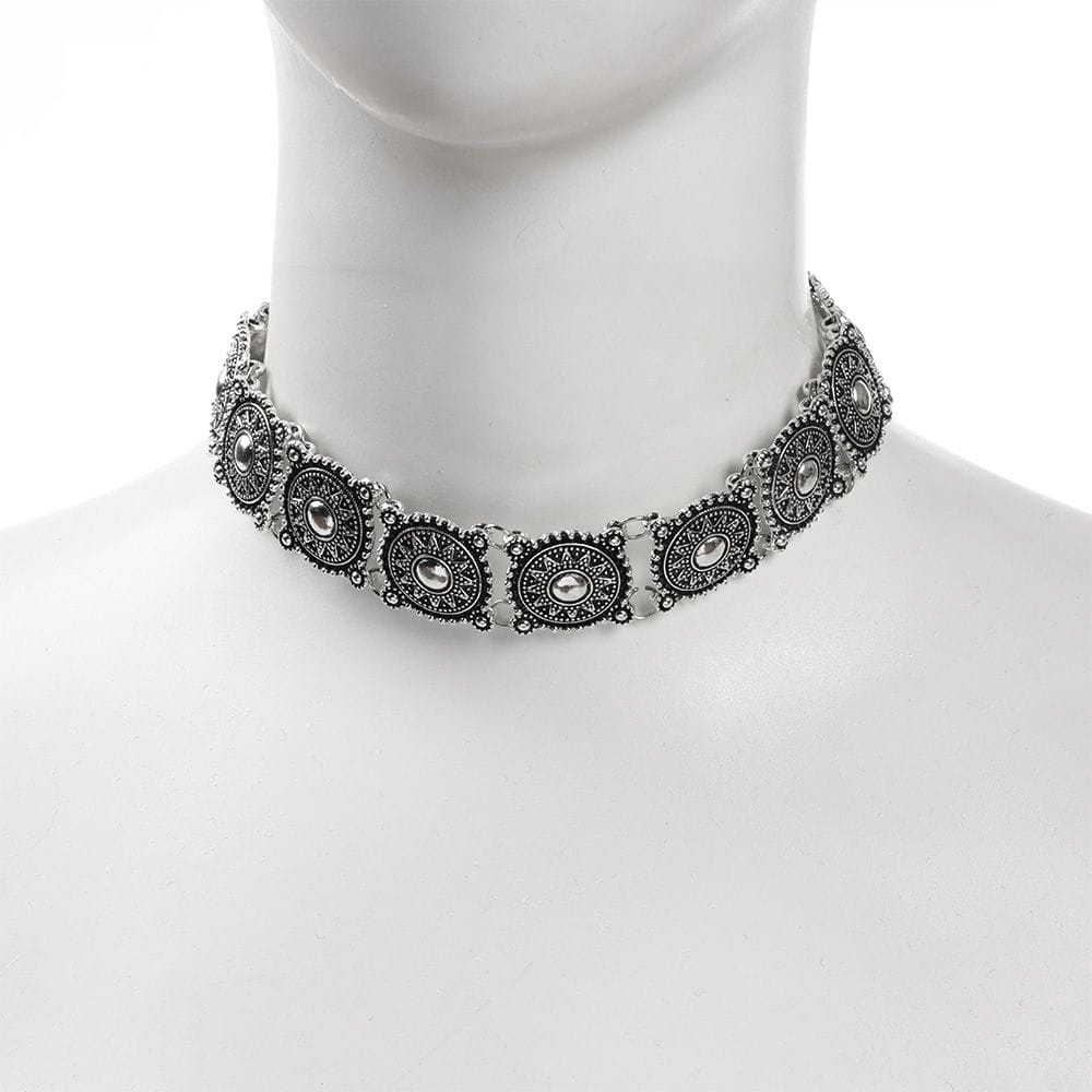 Silver choker necklace from boho silver vintage jewelry set featuring intricate circular medallions and detailed filigree work.