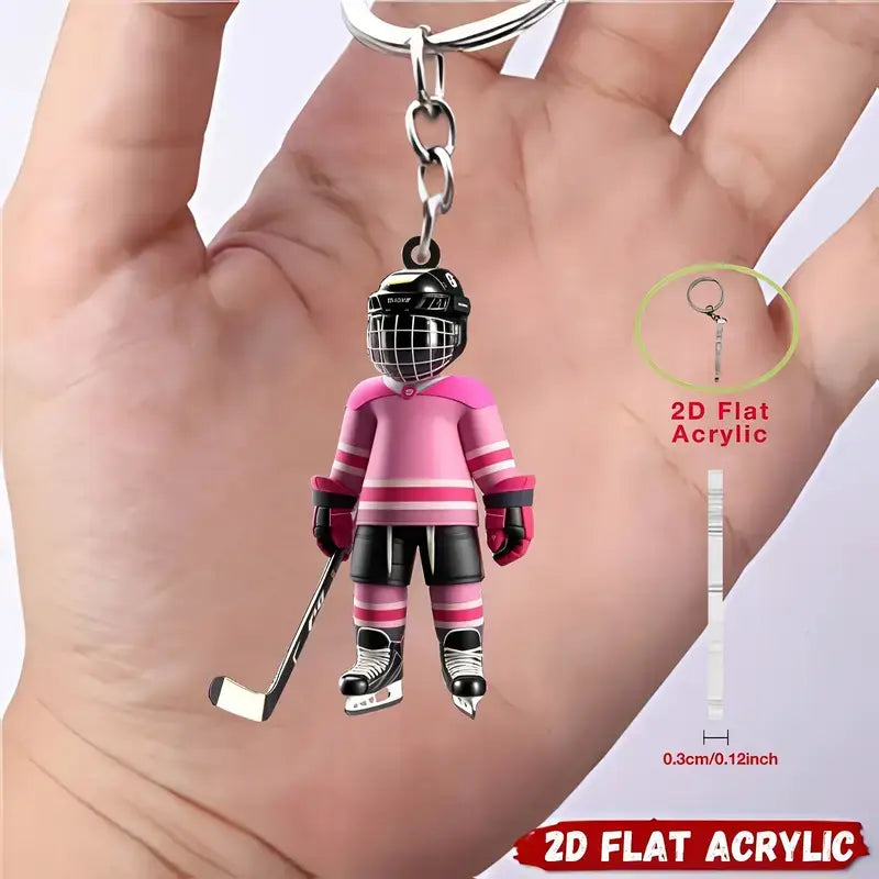 Pink and black hockey player acrylic keychain made of 2d flat acrylic used as a sports backpack charm.