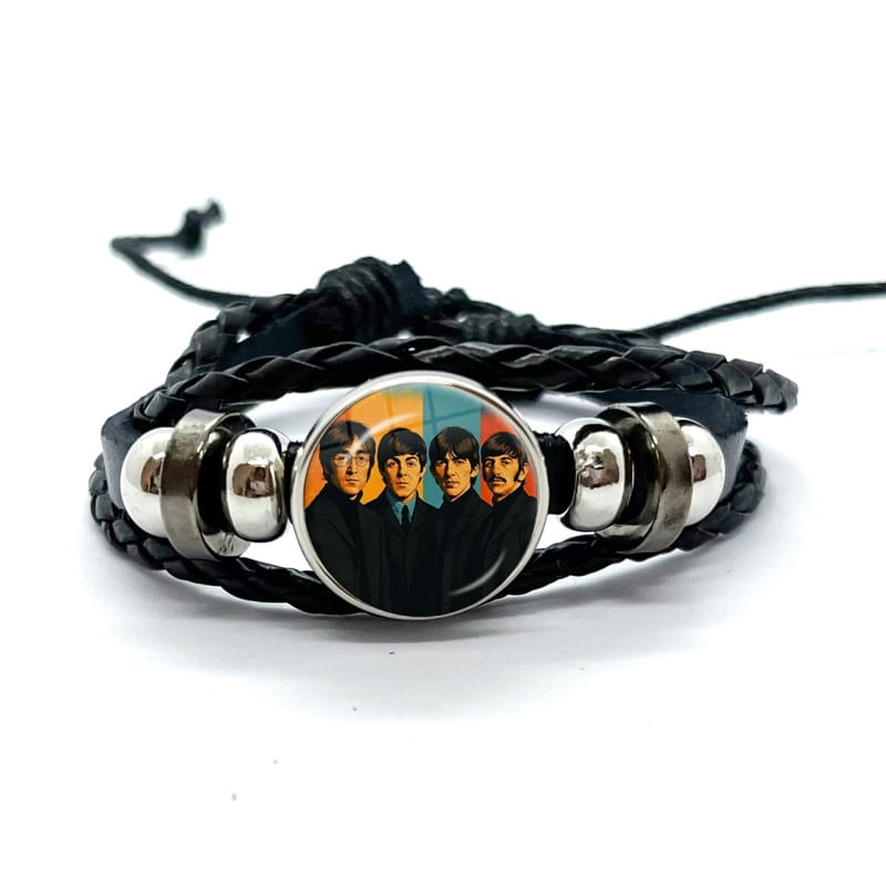 Black braided leather bracelet featuring a circular silver-toned bezel with an image of the Beatles under a glass dome.