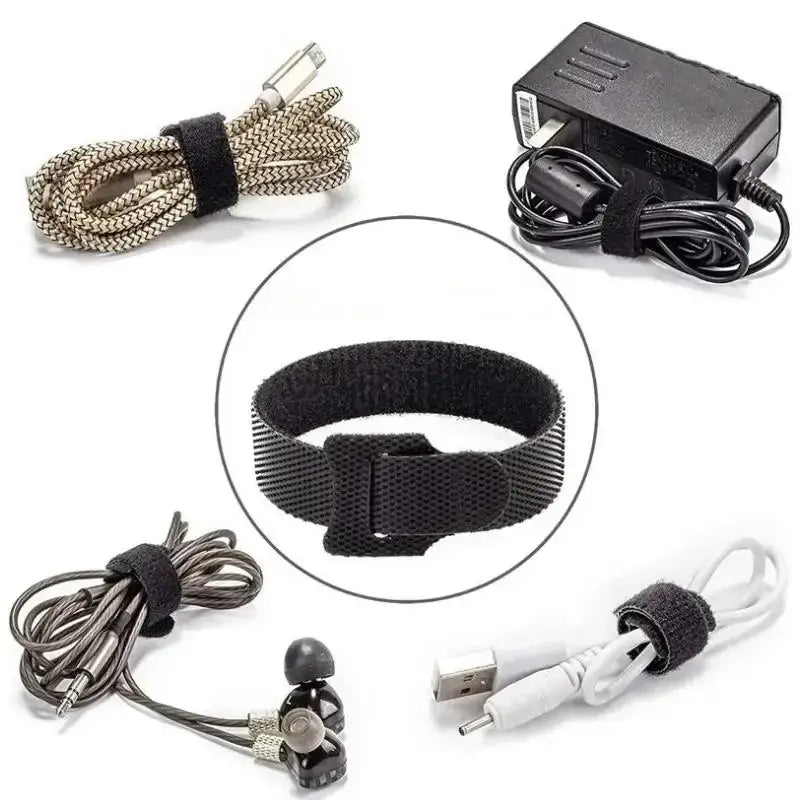 Black cable organizer strap made of durable velcro with a textured surface and secure buckle for wire management.