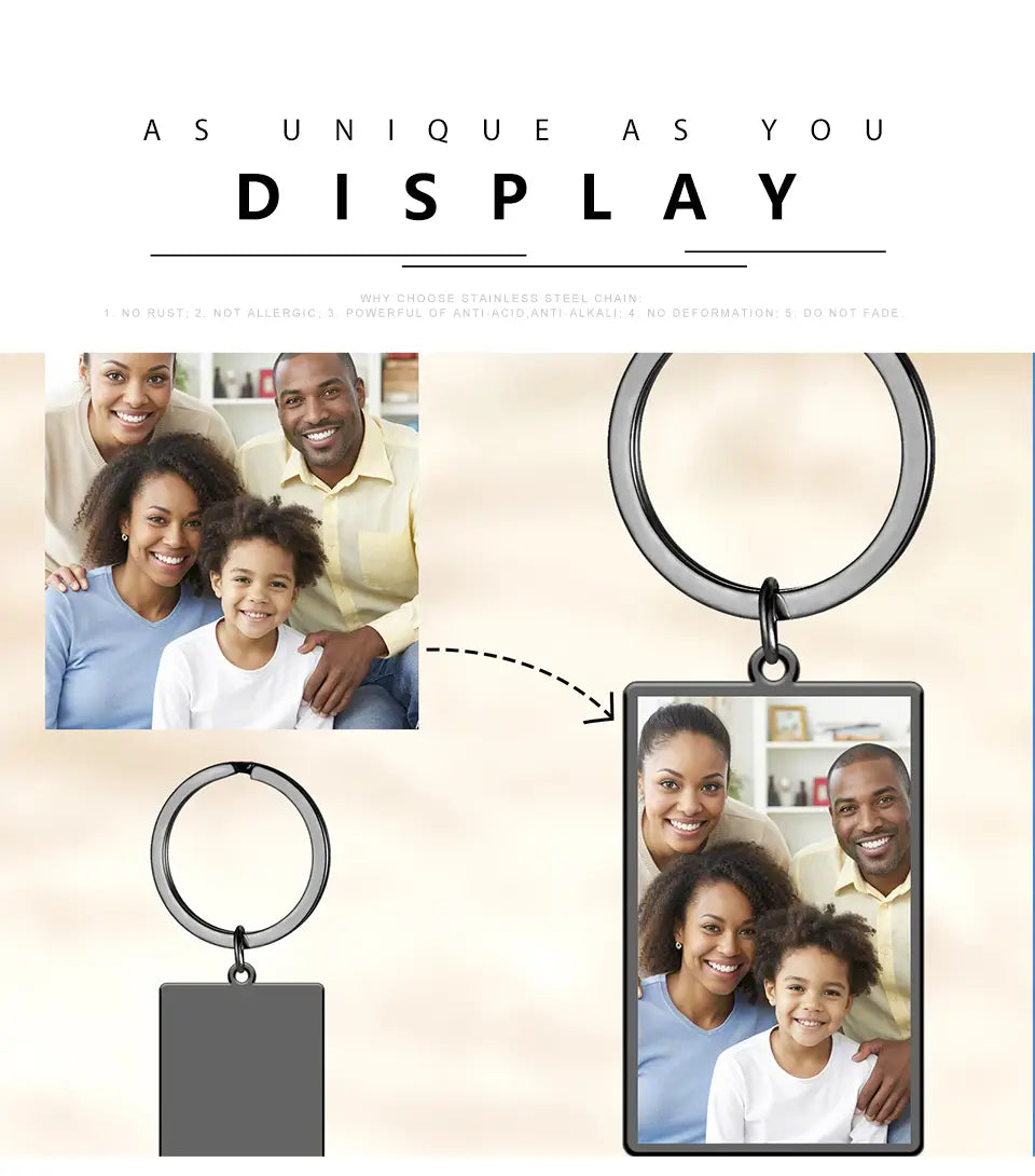 A sleek rectangular stainless steel keychain with a personalized photo of a smiling family from the custom photo rectangle keychain personalized stainless steel ring collection.
