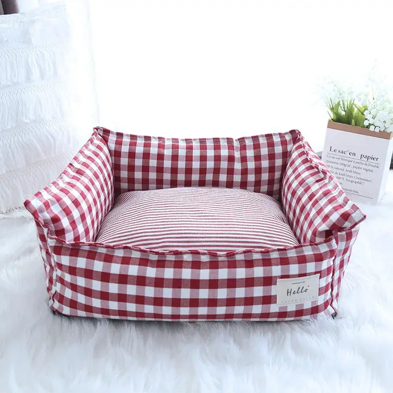 Plush gingham check pet bed cotton dog sofa featuring red and white checkered fabric with a striped cushion inside.