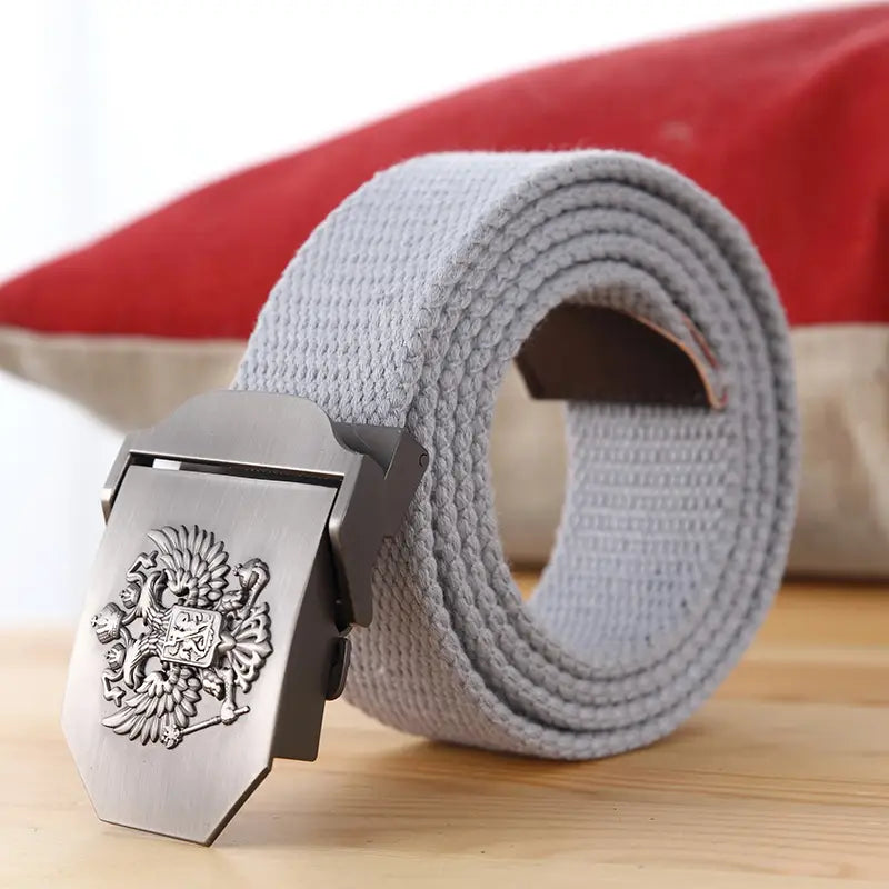 Ceinture tactique en toile grise à aigle russe pour hommes, avec une boucle en métal à finition argent gravée d’un motif d’aigle bicéphale.