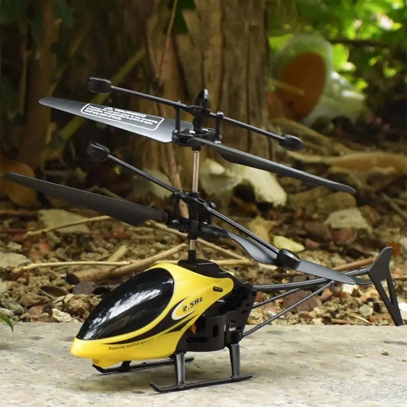 Yellow and black remote control helicopter with a sleek glossy finish and led lights as part of the package includes remote control aircraft toy.