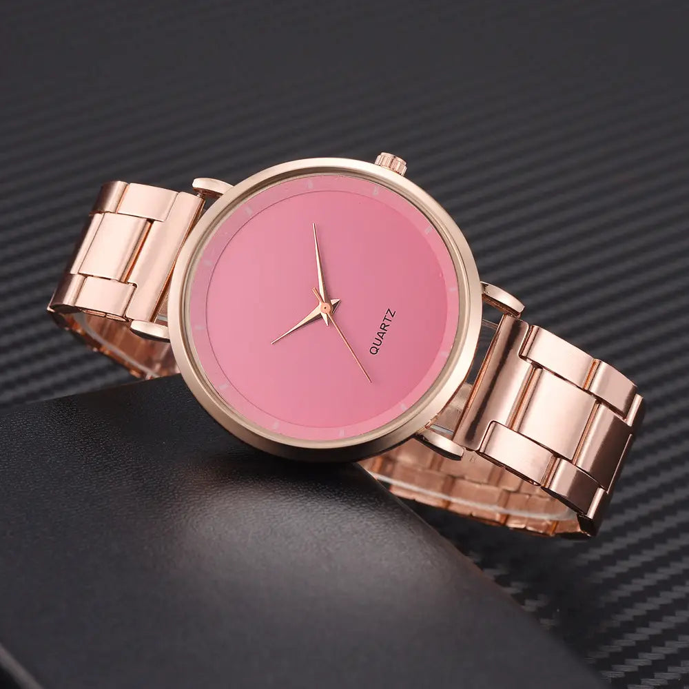 Rose gold women luxury watch quartz business wristwatch featuring a rose gold-toned quartz movement with a sleek minimalist design solid pink dial and matching link bracelet.