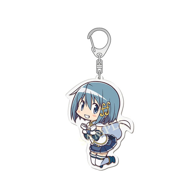 A translucent blue and white acrylic keychain featuring a chibi-style anime character with short light-blue hair wearing a dark blue skirt outfit with gold accents from the Madoka Magica anime acrylic keychain set.