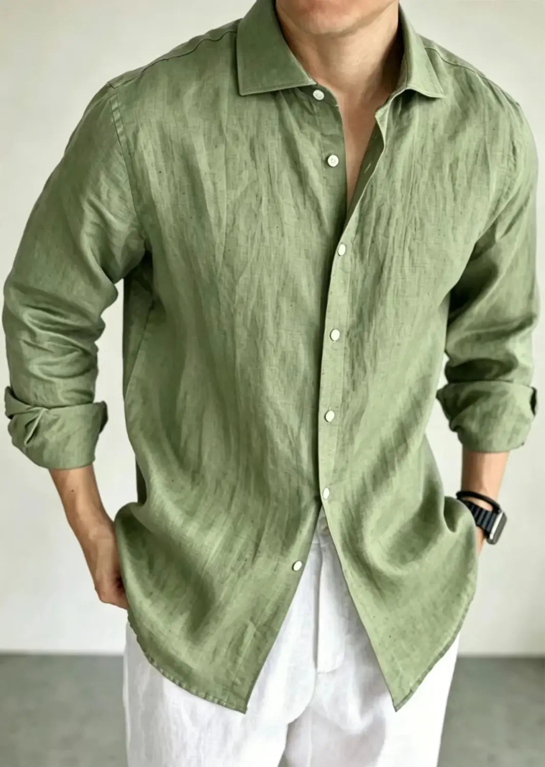 Men cotton linen casual button down shirt in olive green featuring long cotton sleeves, classic collar, and white buttons.