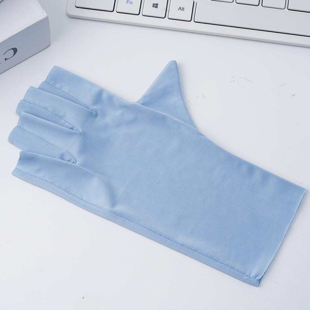 Light blue satin uv protection fingerless sunscreen driving glove with smooth glossy finish and neatly stitched edges shown from the back side.