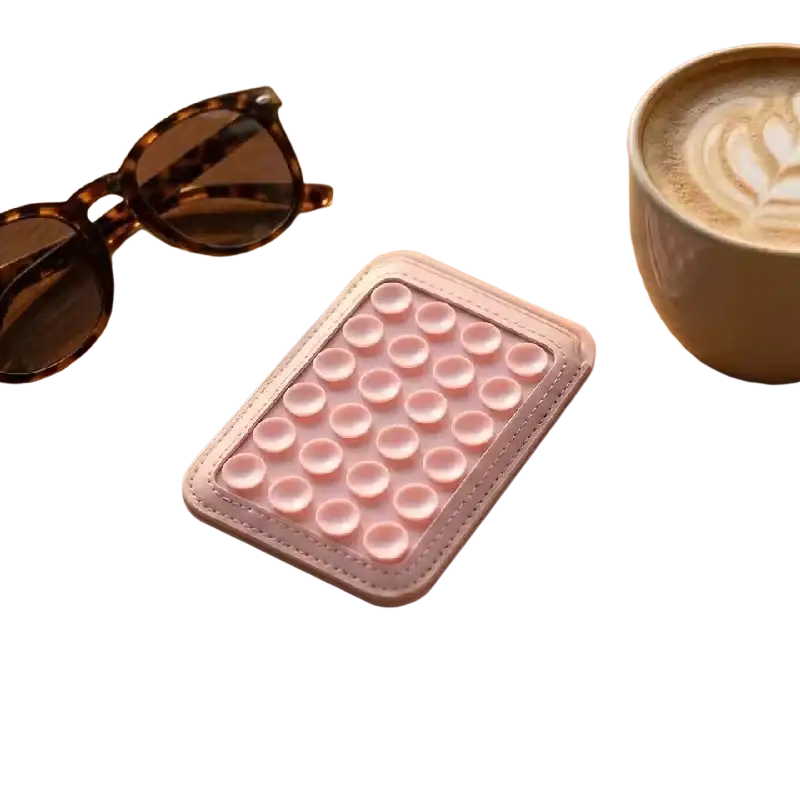Pink silicone magsafe magnetic card holder with stitched edges and foldable phone stand shown from front angle