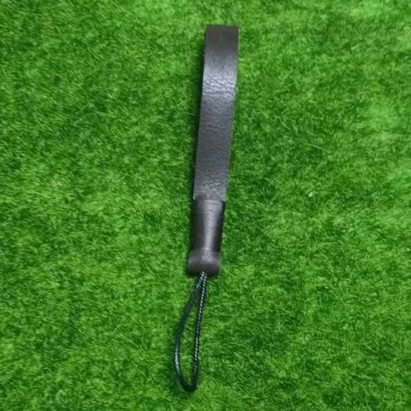 Black leather wrist strap with braided cord attachment for leather weave lanyard keychain car key holder.