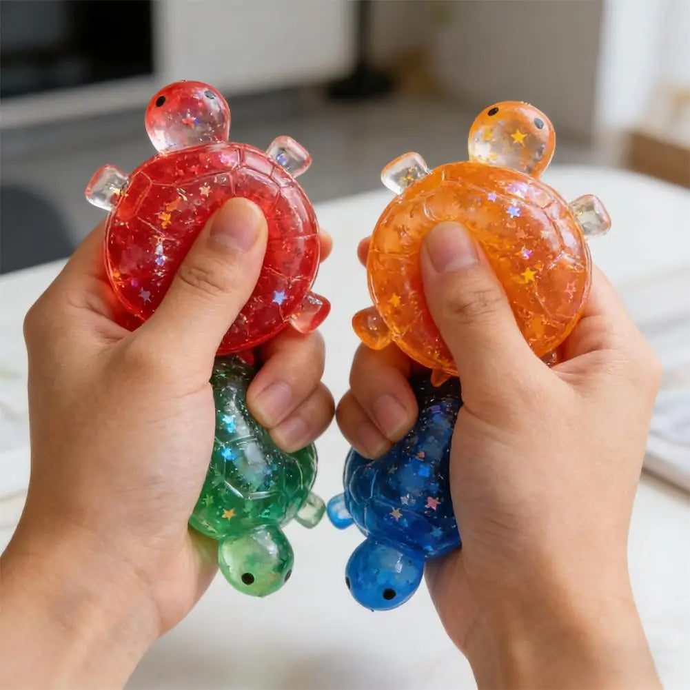 Farbenfrohe durchscheinende Schildkröten-Spielzeug-Fidget-Spielzeuge mit sternenklarem Glitzerfüllstoff und klaren Plastikhüllen, entworfen als Stressbälle für weiches Knautschen zur Entlastung.
