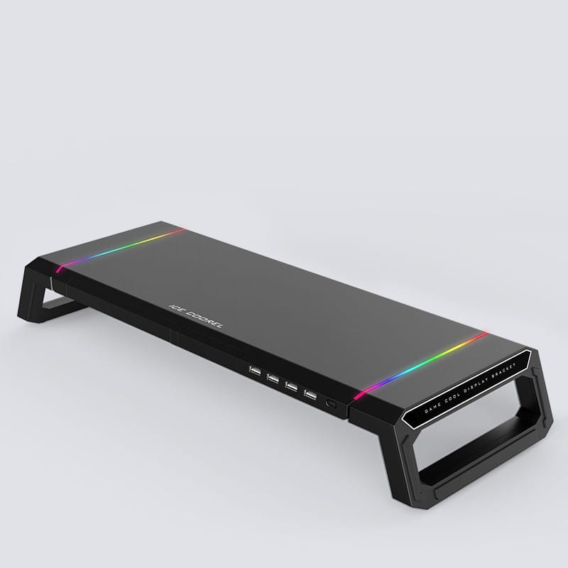 Support de moniteur RGB noir avec station d’accueil USB et tiroir de rangement, doté d’un éclairage LED arc-en-ciel le long des bords et de plusieurs ports USB sur le côté.