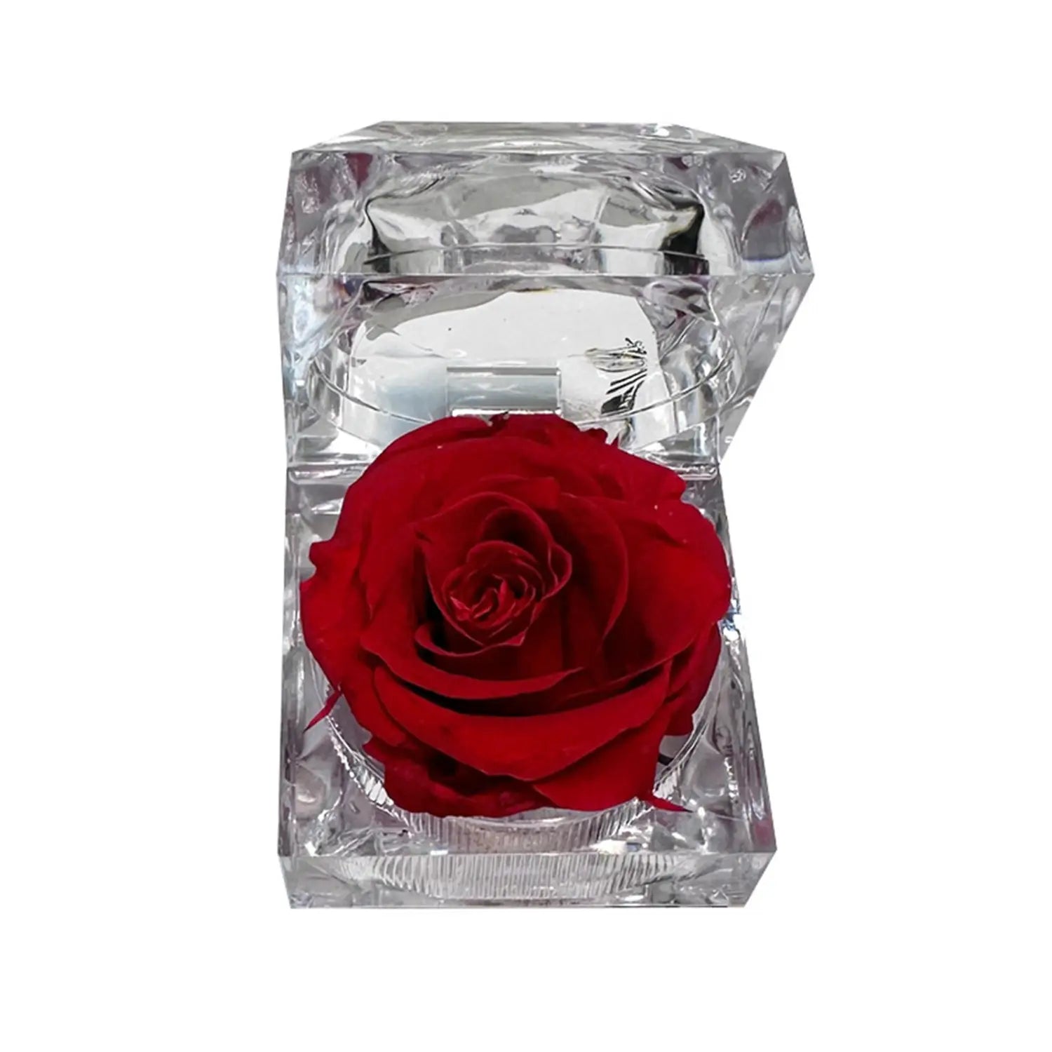 A vibrant red preserved rose displayed inside a clear faceted crystal gift box, showcasing the eternal flower design.