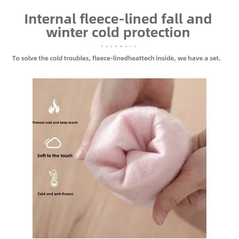 Soft pale pink fleece-lined thermal sleeve of waterproof kitchen gloves designed for fall and winter cold protection during cleaning tasks.