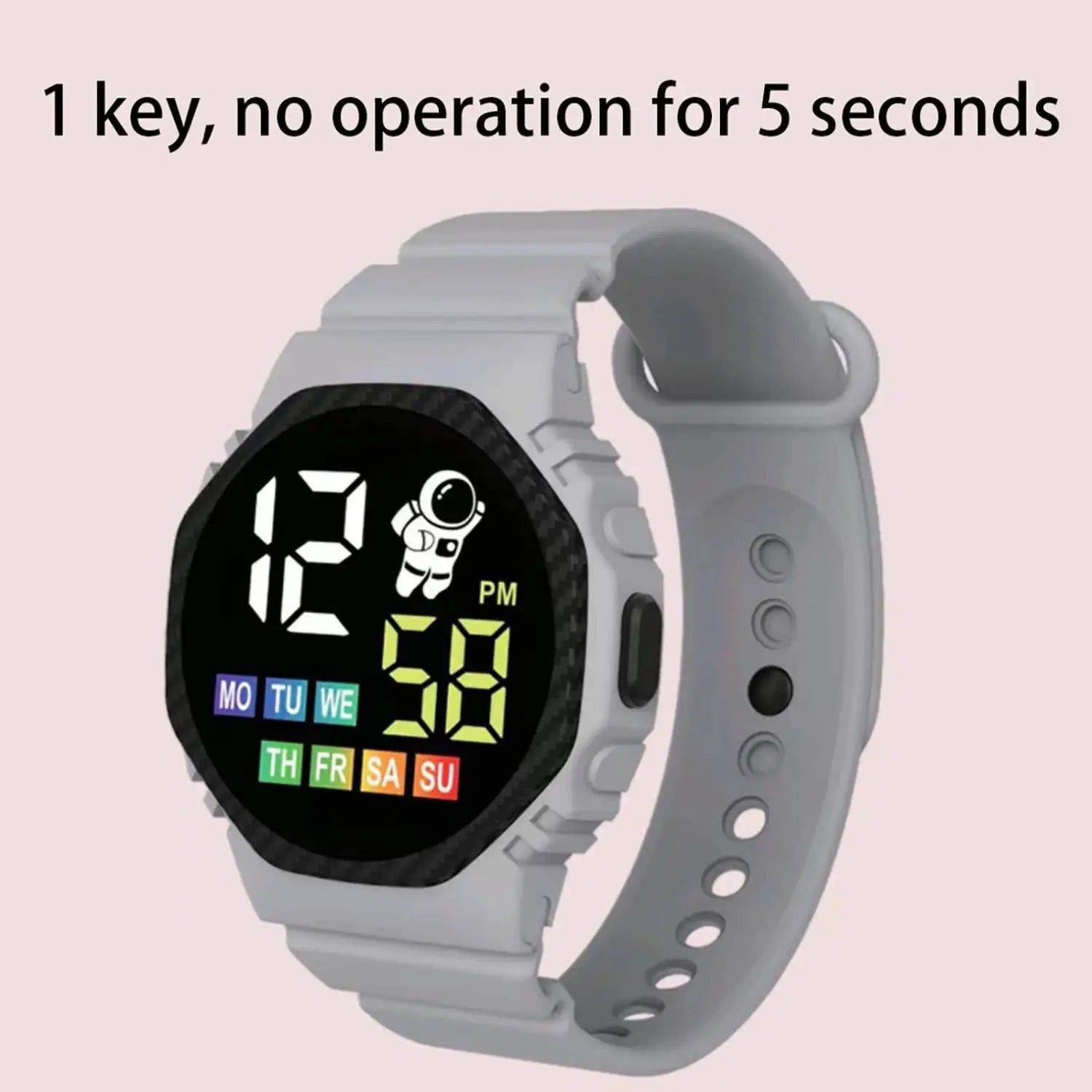 Gray kids waterproof led digital astronaut watch with black carbon fiber textured face displaying time and day in bright green digits alongside an astronaut icon.