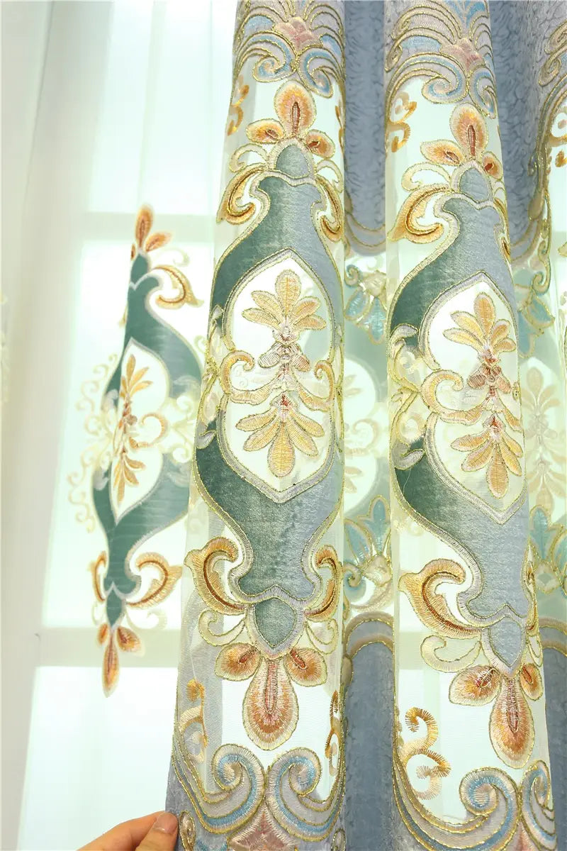 Elegant blue and gold embroidered living room curtains featuring intricate floral patterns designed for french window use