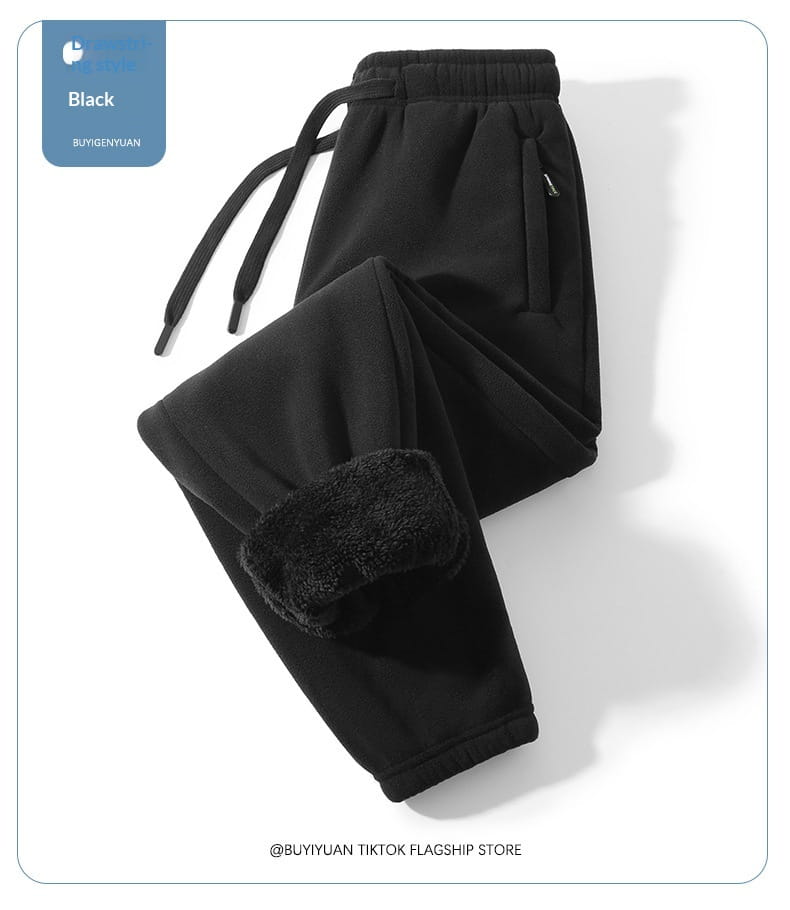 Pantalons de survêtement d’hiver décontractés pour hommes doublés en polaire en noir, type jogger, avec poignets doublés de fausse fourrure moelleuse et taille élastique.