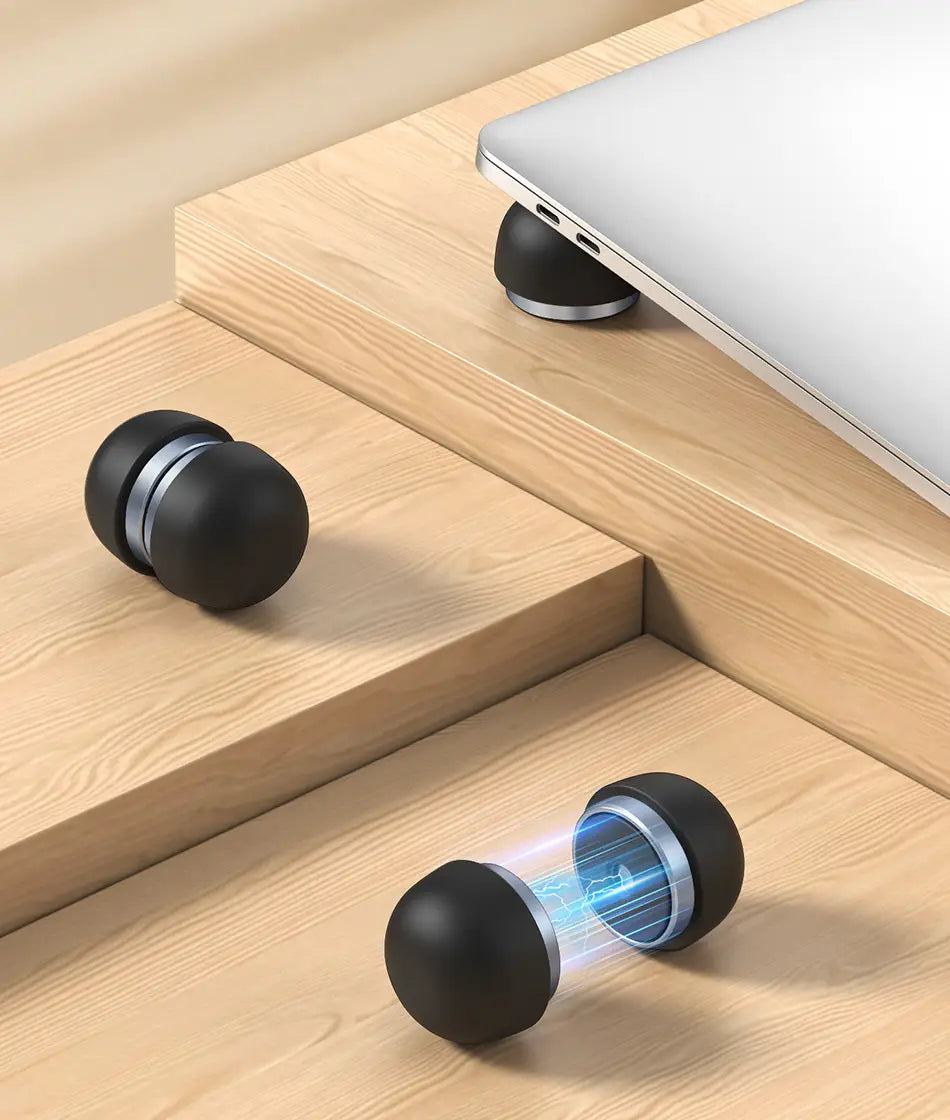 Rocoren magnetic laptop stand and cooling holder black spherical design with silver metallic ring and glowing blue internal light.