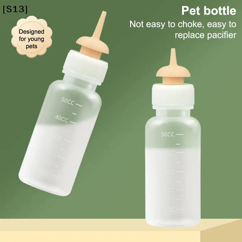 transparent plastic cat bottle feeder with unique design featuring a beige silicone nipple white screw-on cap and 50cc measuring scale for feeding newborn pets