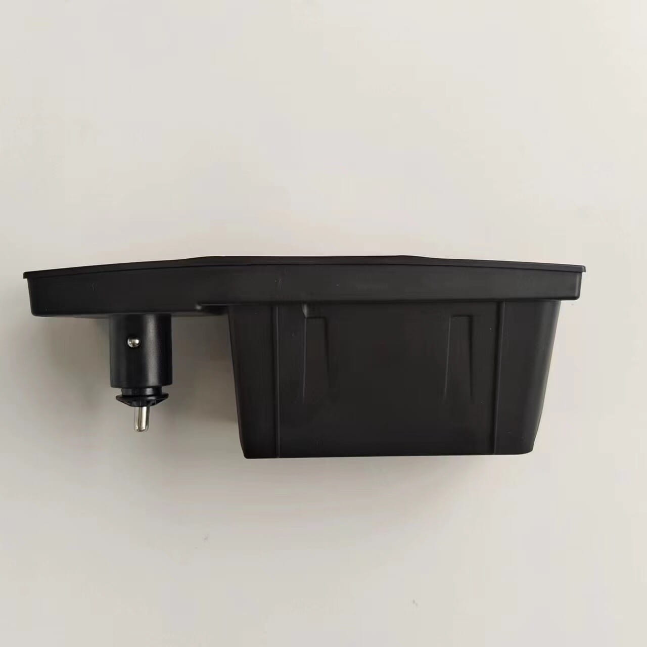 black plastic audi a6 c7 rs6 s7 wireless car charger pad with rectangular body and integrated power outlet