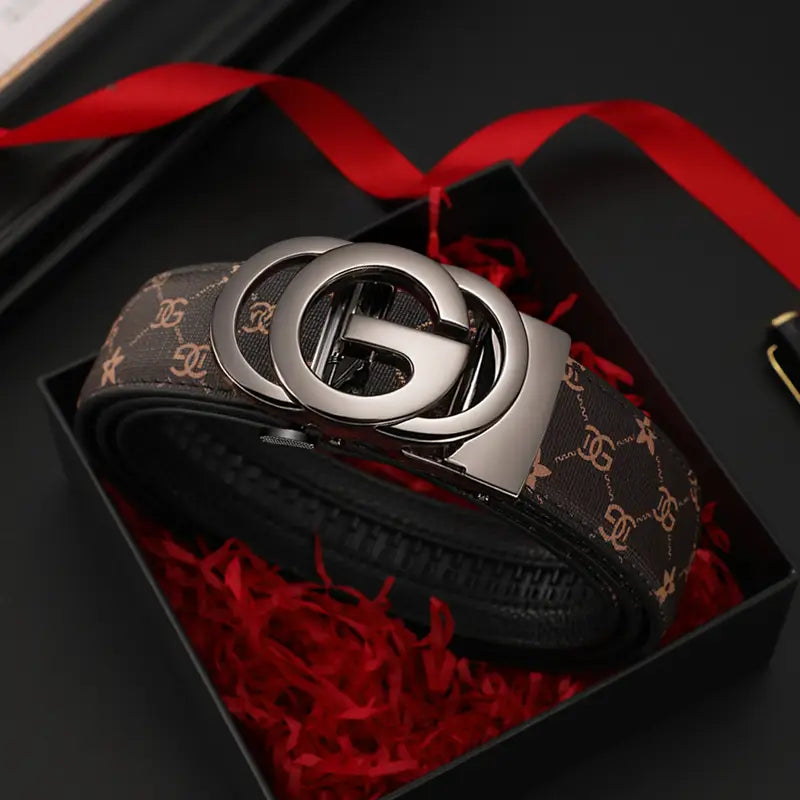 Men leather automatic buckle belt in brown leather with gold-toned interlocking G logo pattern and silver-tone double G buckle presented in an elegant black gift box lined with red shredded paper.