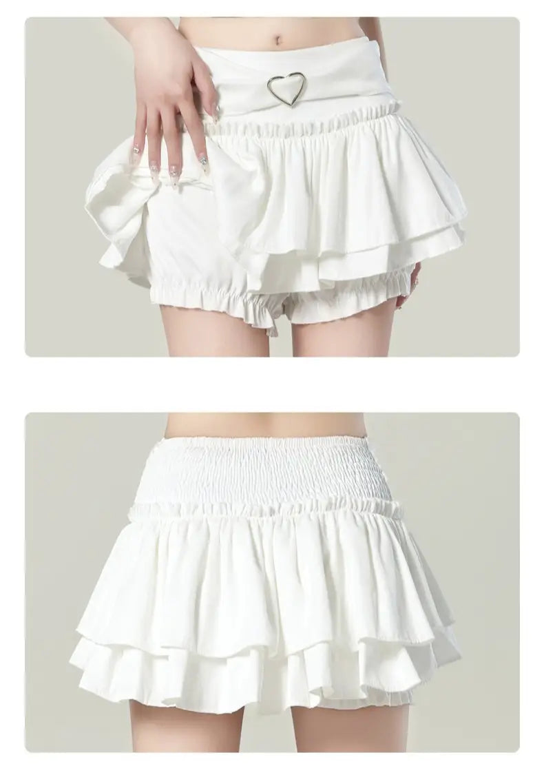 White ruffled high waist mini skirt with heart-shaped metal belt buckle in Y2K style.