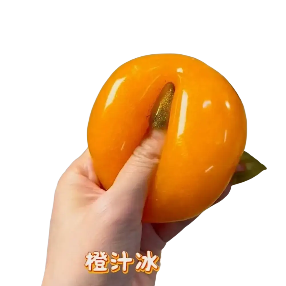 Handmade orange slushy squishy toy soft slow rebound stress relief peach shape with glossy surface and golden glittery stem
