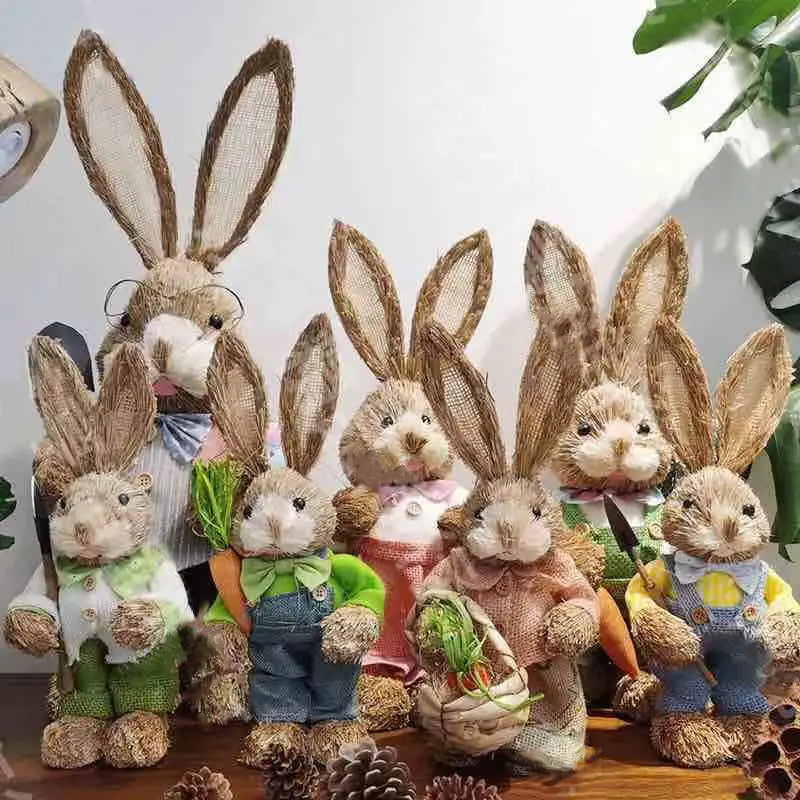 A group of 35cm straw Easter rabbit figurines featuring rustic straw texture and colorful handmade woven fabric outfits.