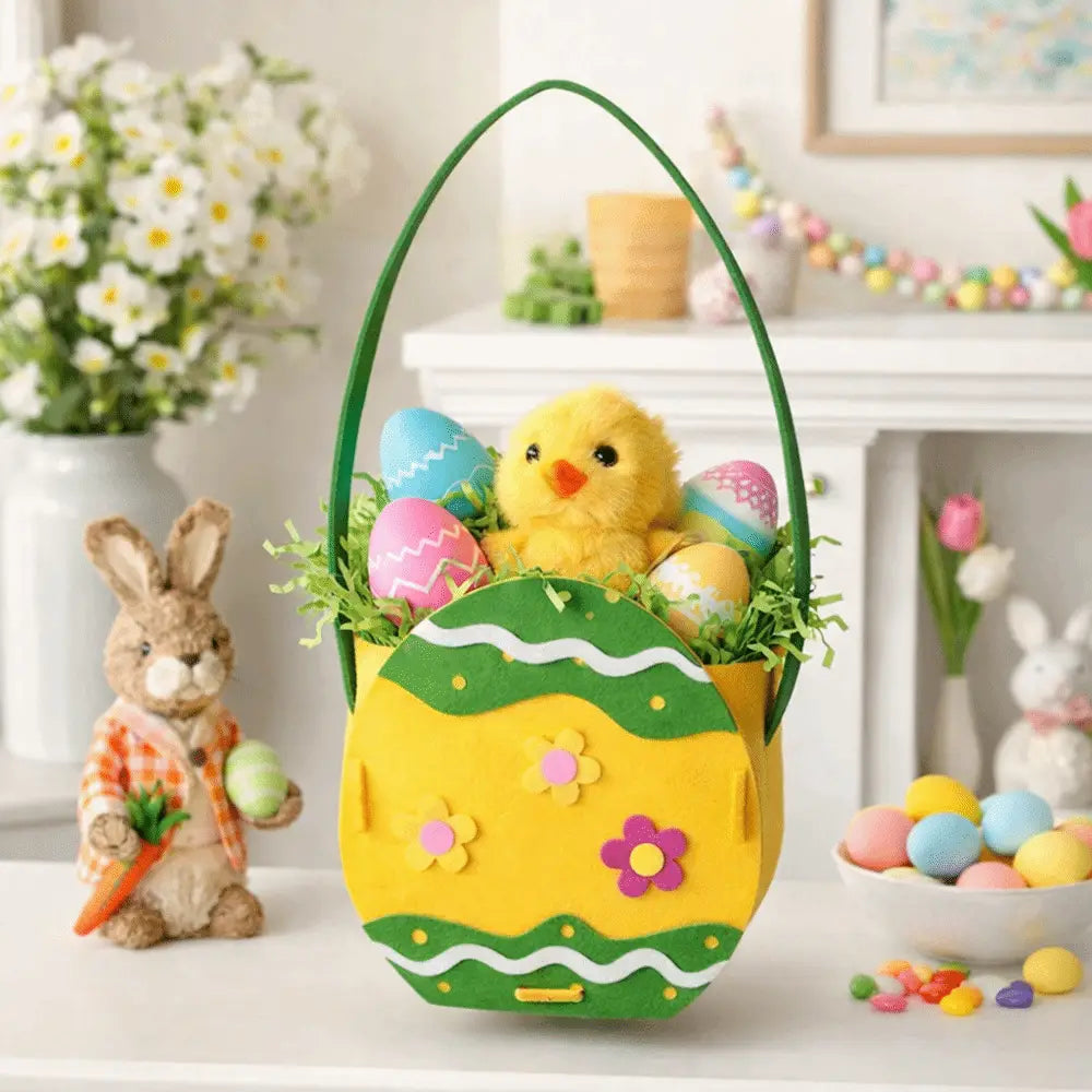 A cheerful yellow and green felt Easter bunny basket gift bag shaped like an egg with floral appliqués filled with colorful eggs and a plush chick.