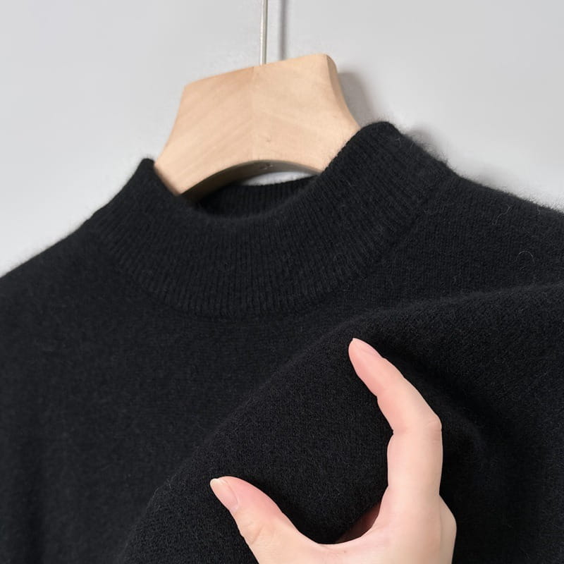 Herren-V-Ausschnitt-Strickpullover in Schwarz aus weich strukturierter Strickware mit geripptem Rundhalsausschnitt, Casual-Winterpullover.