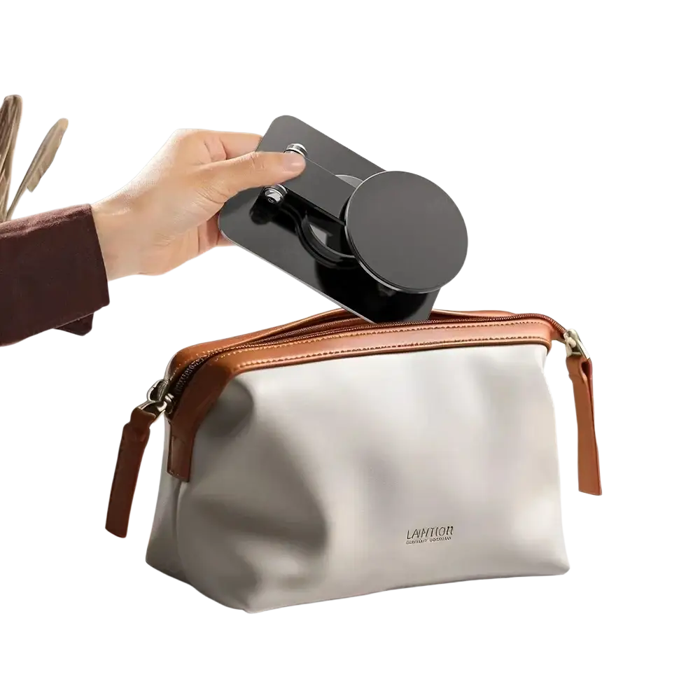 Black folding phone holder with circular base and 360° rotation shown from front as phone stand for pro max models