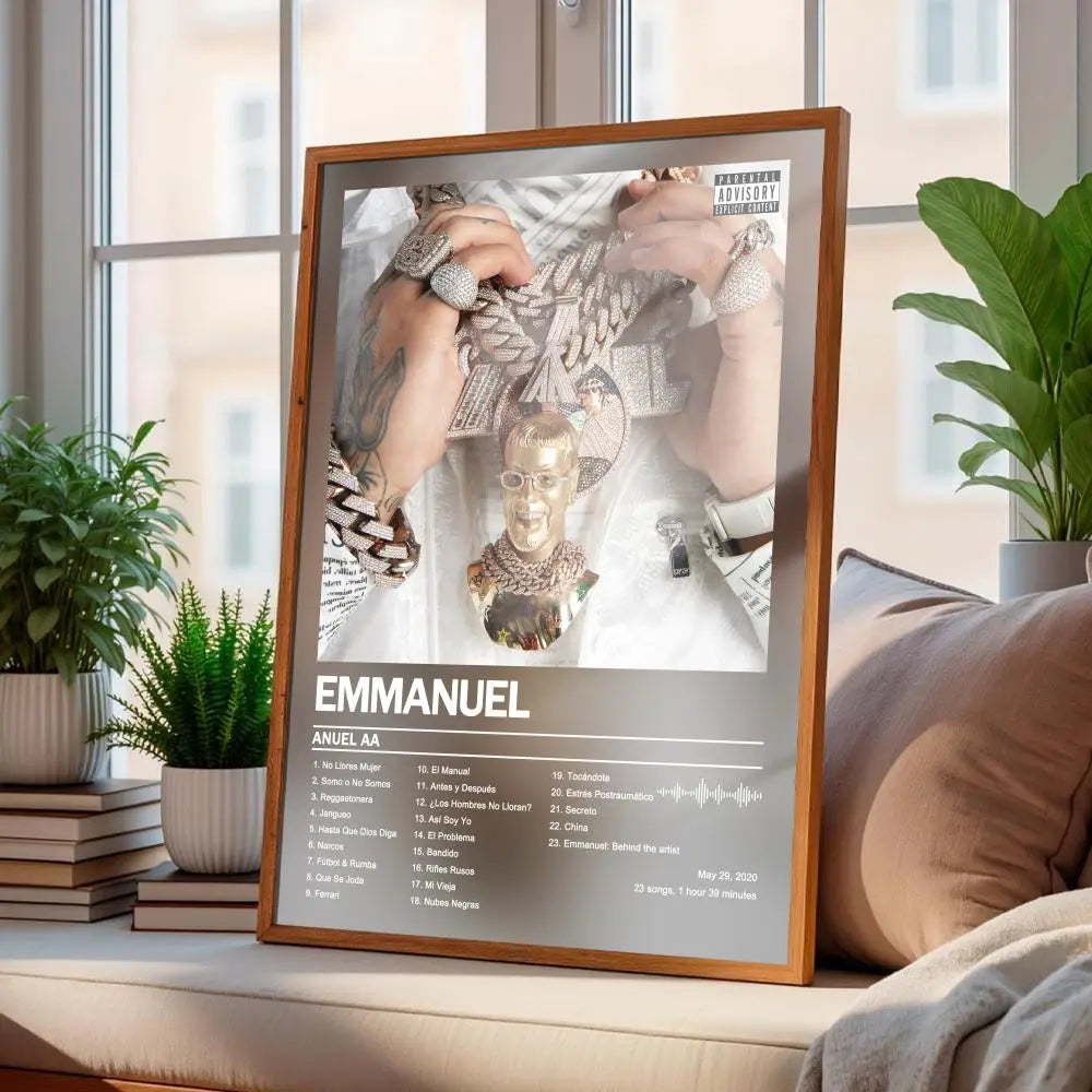 wood-framed wall art print of anuel aa album cover emmanuel featuring gold chains and jewelry on a white background with tracklist details in modern style for art home decor.
