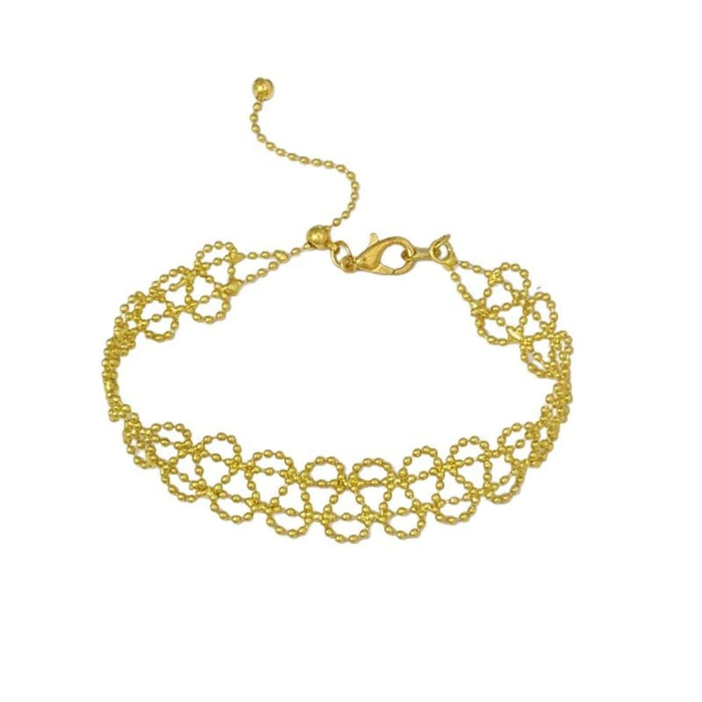 Metal lace bracelet featuring a gold-toned beaded lace design with a delicate interlocking chain and a secure adjustable clasp for fashion jewelry.