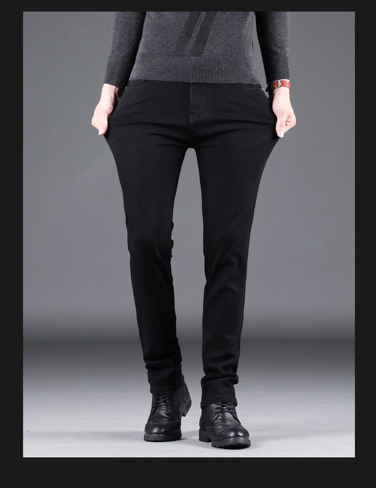 Men black slim fit stretch denim jeans featuring smooth stretchy fabric and subtle stitching details.